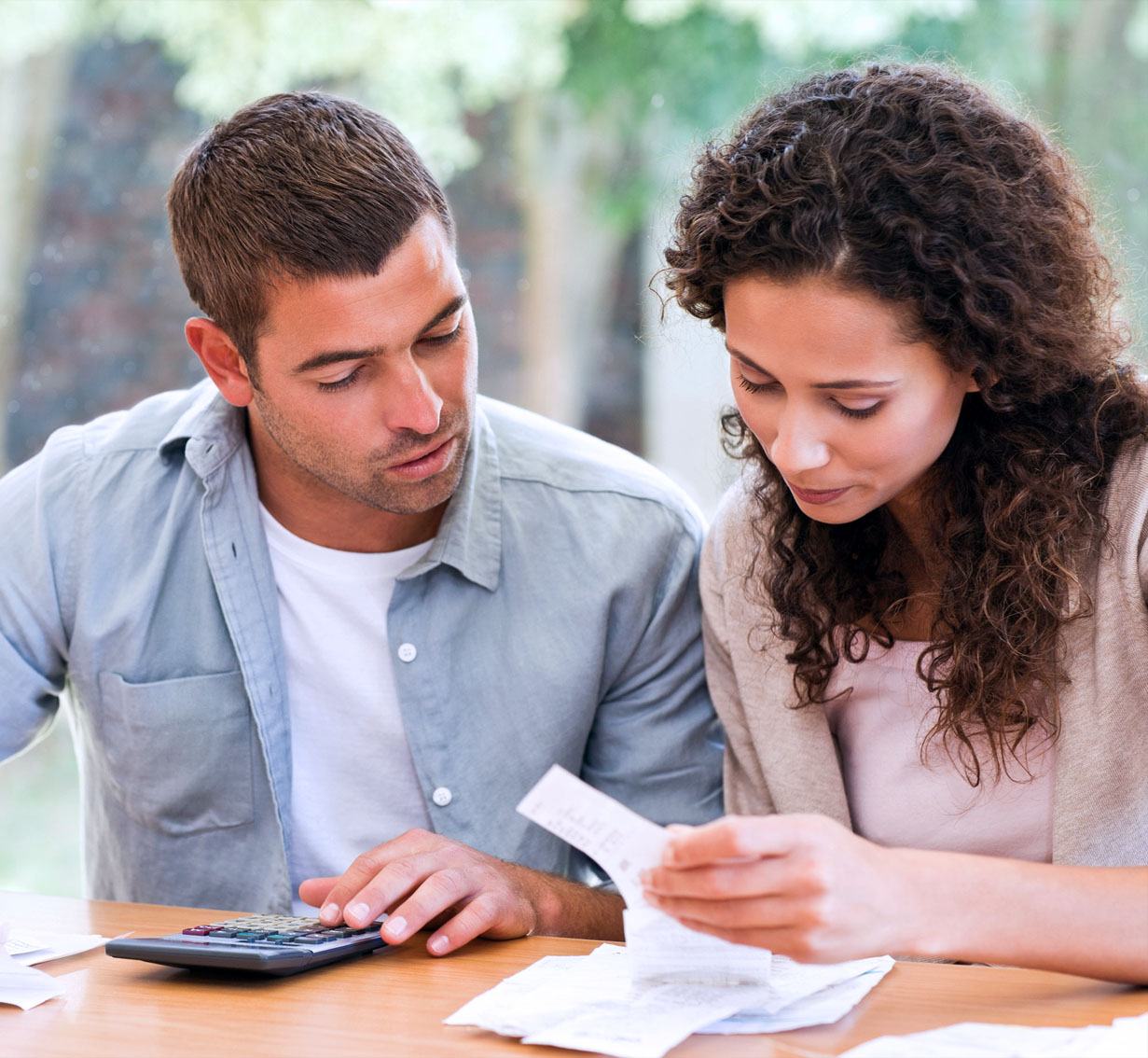 New Jersey Credit Repair Lawyers Couple Looking at Bills